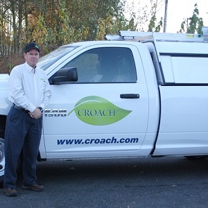 Croach Pest Control Technician Standing Next to Vehicle - 300x300