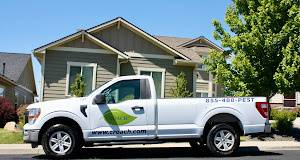 Croach Pest Control Technician Truck in front of home